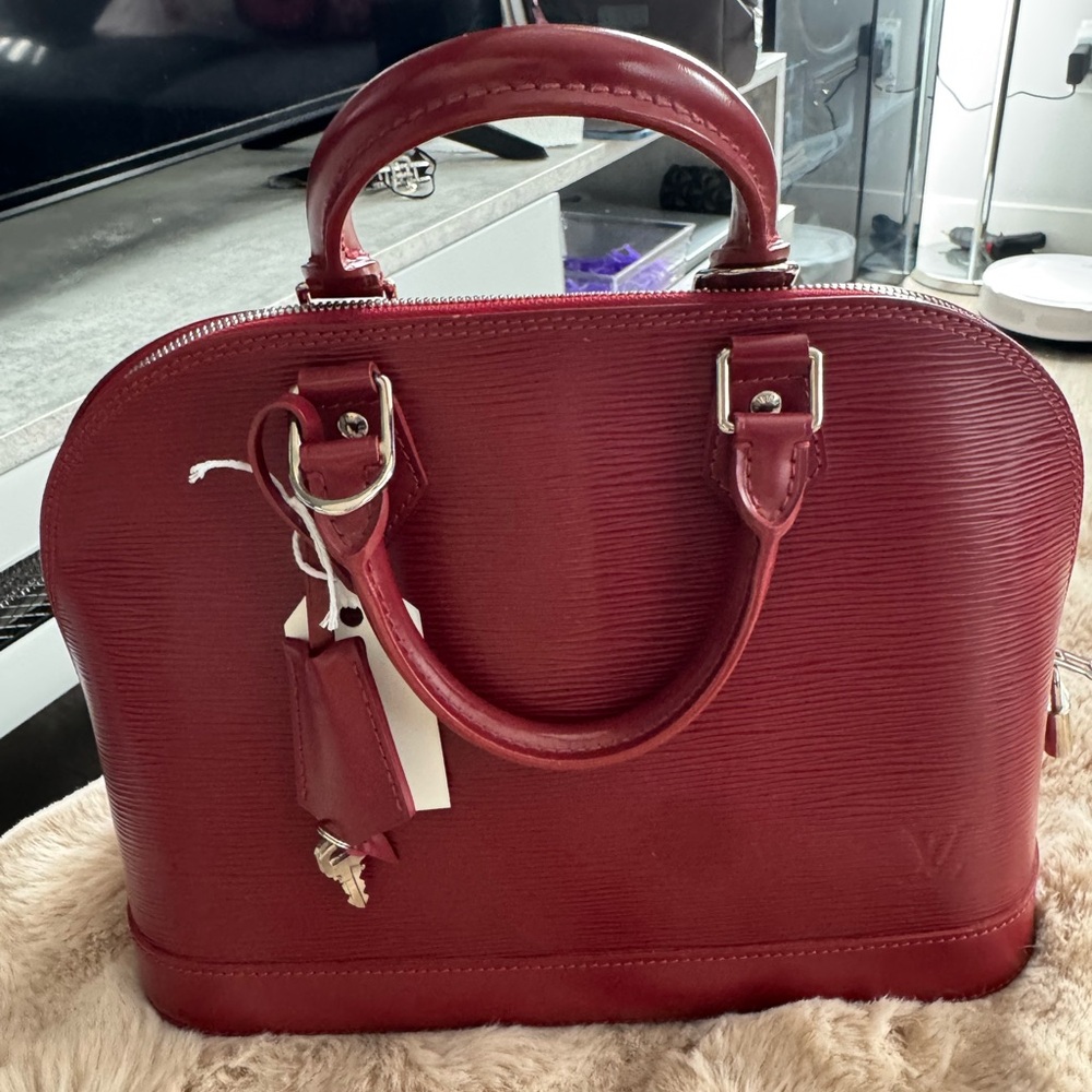 authentic louis vuitton alma pm epi handbag
